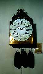 Morbier-Uhr mit Sonnenkopf