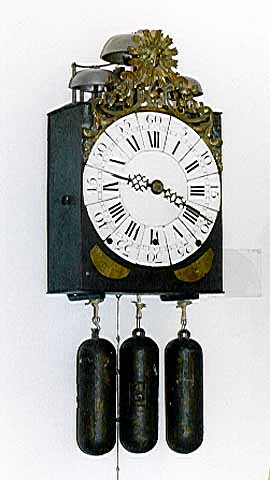 Seltene Morbier-Uhr mit grossem Sonnenkopf
